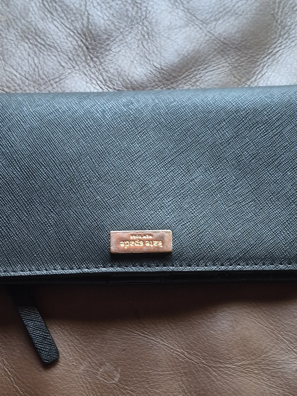 kate spade Black Saffiano Leather Clutch with Gold Logo Plaque